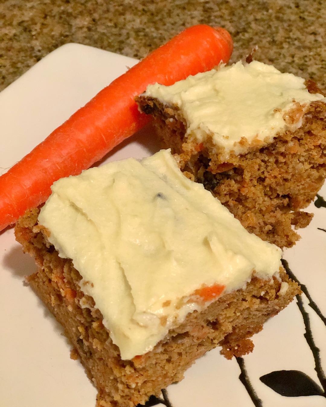 I saw carrot cake when I was at Texas De Brazil the other night and I just needed to have some so made this 275 calorie, 26.5g fat, 5.5g net carbs, 9g protein per piece carrot cake (18 pieces in this recipe). I used my fitness pal to get those so the actual amounts may differ… I ate way more than one piece yesterday and my glucose levels today were 79 mg/dL and ketones .6… My gluten free friends LOVED it… so thrilled about this recipe; Try it out and let me know what you think!
——
For the Cake:
2 cups almond flour
3/4 cup coconut flour
4 tsp baking powder- gluten free
1 tsp baking soda
3 tsp ground cinnamon
1 tsp ground nutmeg
1/2 tsp ground cloves
1/4 tsp salt
6 large eggs
1 1/4 cups swerve
1 stick unsalted butter, melted
1 1/4 heavy cream
1/4 cup water
1 pound carrots unpeeled, grated
Optional: 1 cup crushed walnuts (increases all macros by a LOT)
——
For the Cream Cheese Frosting:
8 ounces cream cheese, softened but still cool
5 tablespoons unsalted butter, softened but still cool
1 teaspoon vanilla extract
3/4 cup swerve
——
Cake:
Preheat oven to 350 degrees
Grease a 9″ x 13″ rectangular baking pan with butter.
Combine almond flour, coconut flour, baking powder, baking soda, cinnamon, nutmeg, cloves, allspice, and salt in a medium bowl.
In a large bowl, beat eggs until well beaten. Add swerve, butter, and milk. Add flour mixture and mix thoroughly. Fold in Carrots with a rubber spatula or wooden spoon, until the mixture is fully combined.
Transfer batter to prepared pan and bake until center of cake is firm to the touch, about 40-45 minutes.
Let cake cool completely before frosting, otherwise frosting will melt
——
frosting: 
Using a hand-held mixer, beat cream cheese, butter, vanilla, and swerve on low speed until mixed. Increase speed to medium and beat until slightly fluffy, about 2-3 minutes